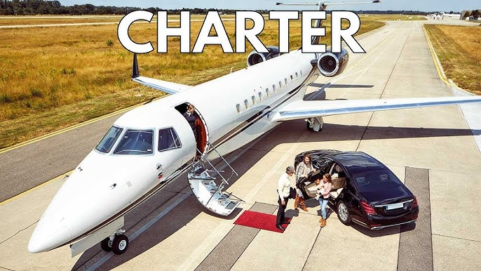 A business traveller booking a private jet charter on a laptop, planning a trip in Australi