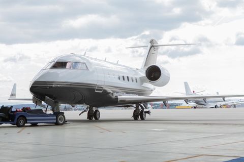 a large jetliner sitting on top of an airport tarmac