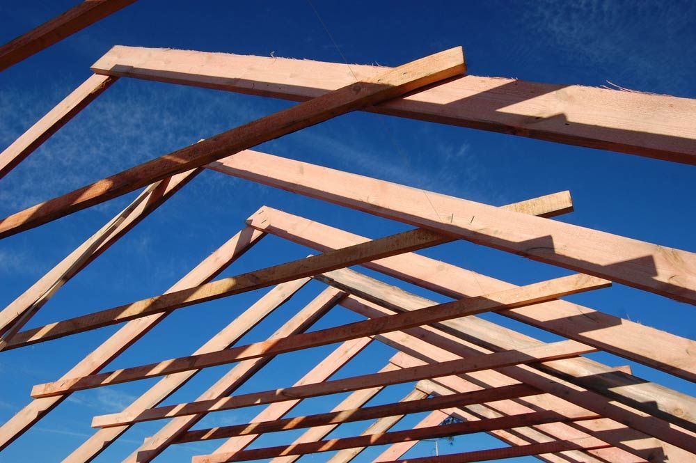 Wood Roof Trusses Viewed From Inside Of New Home — Trussted Frames & Trusses in Port Stephens, NSW