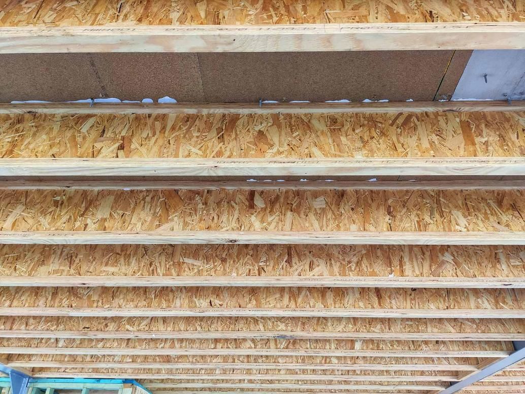 A Close up Of a Wooden Ceiling — Trussted Frames Trusses in Bennetts Green, NSW