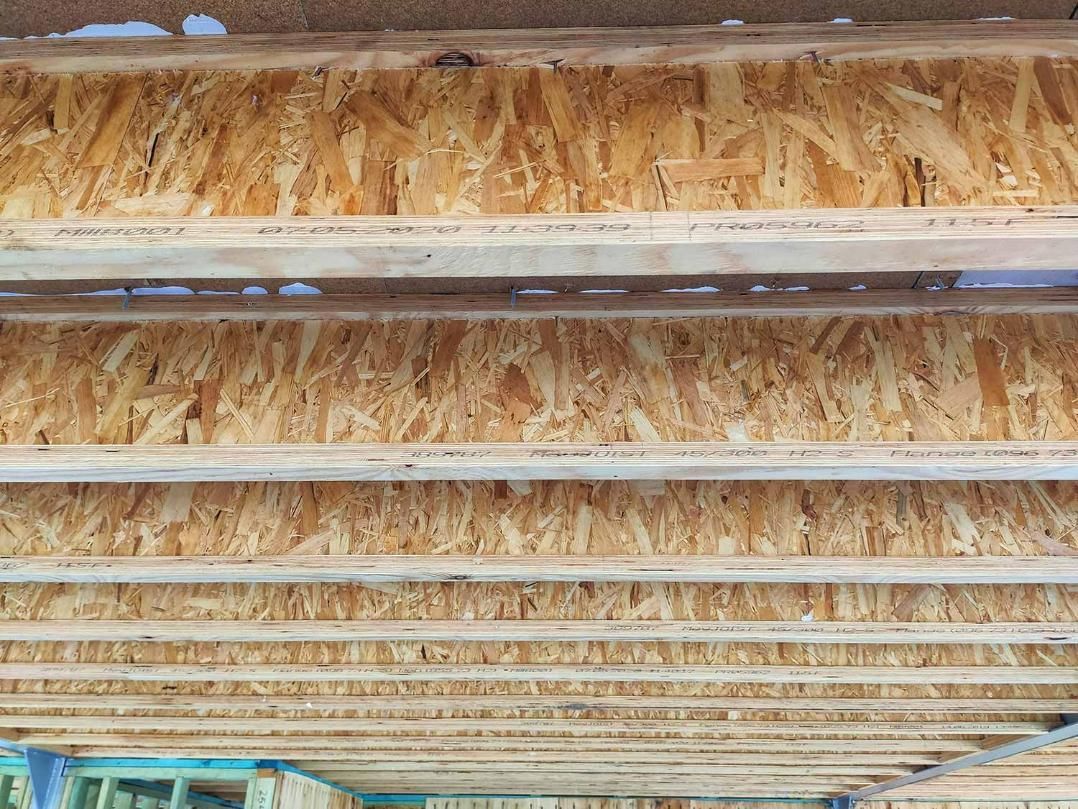 A Close up Of a Wooden Ceiling in A Building Under Construction — Trussted Frames Trusses in Bennetts Green, NSW