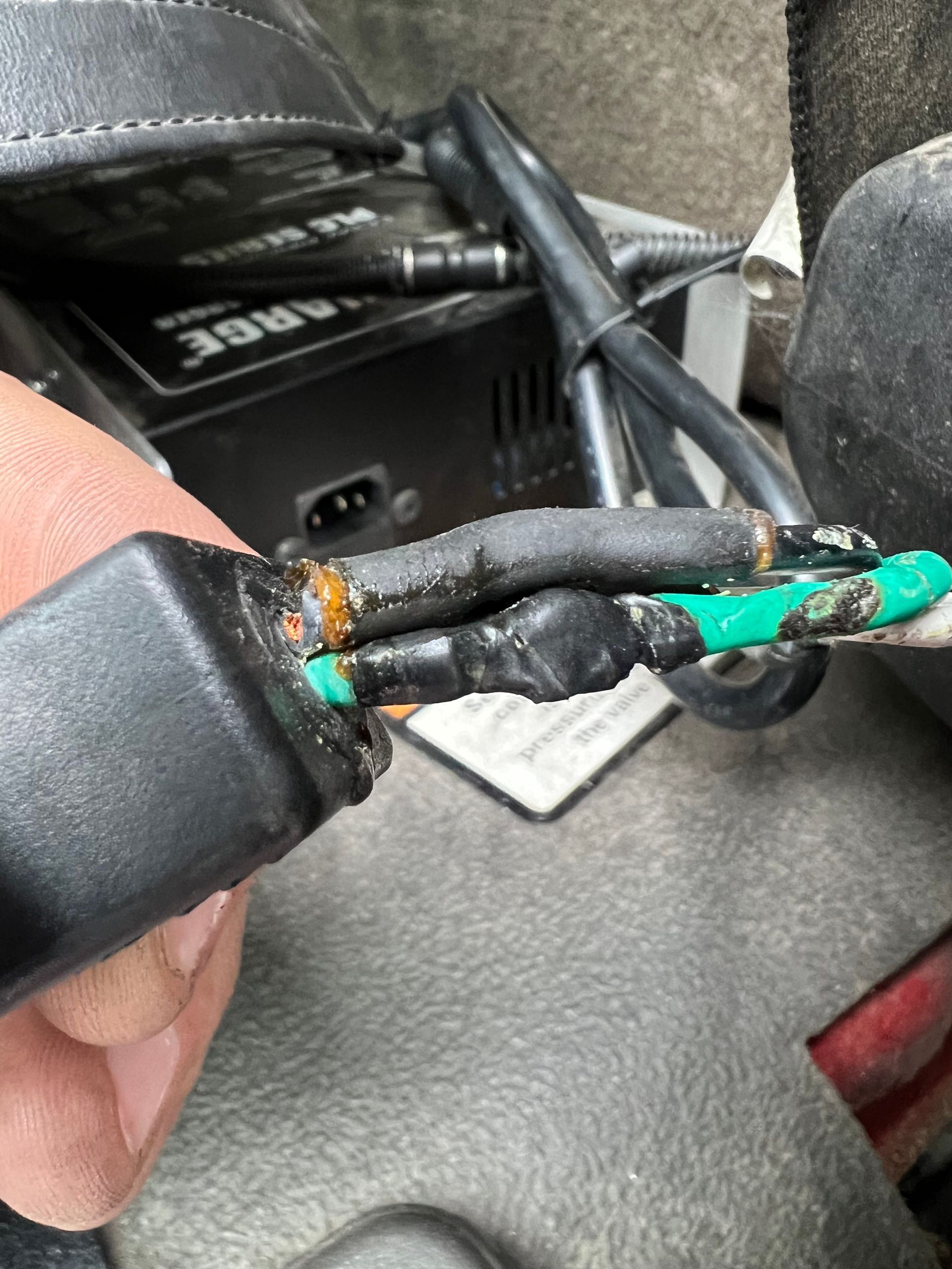 We were notified of an issue with an onboard battery charger that was not properly charging or maintaining the vehicle’s batteries. During diagnosis, our team located a pinched ground wire caused by improper wire placement and lack of protection. The damaged wire left the charger inoperable. We replaced the plug and corrected the wiring, restoring the charger to full operation and ensuring the batteries remain properly maintained.