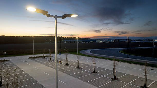 Air conditioning units with toolbox and gloves in backyard.
