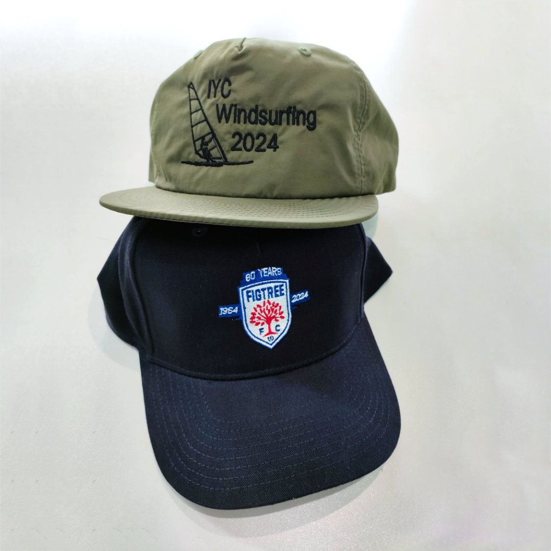 A Blue And Green Hat With Personalised Embroidery — NMTG Embroidery In Wollongong, NSW