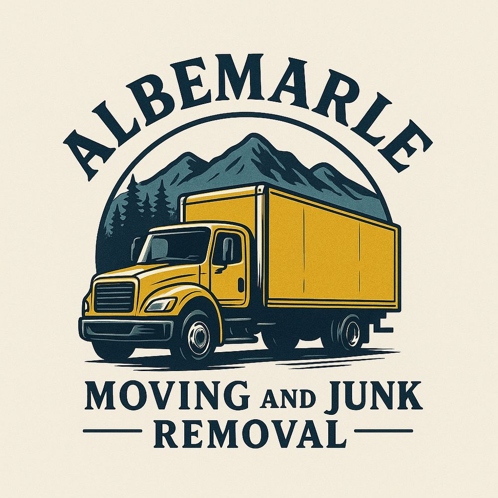 A yellow truck is driving down a road with mountains in the background.