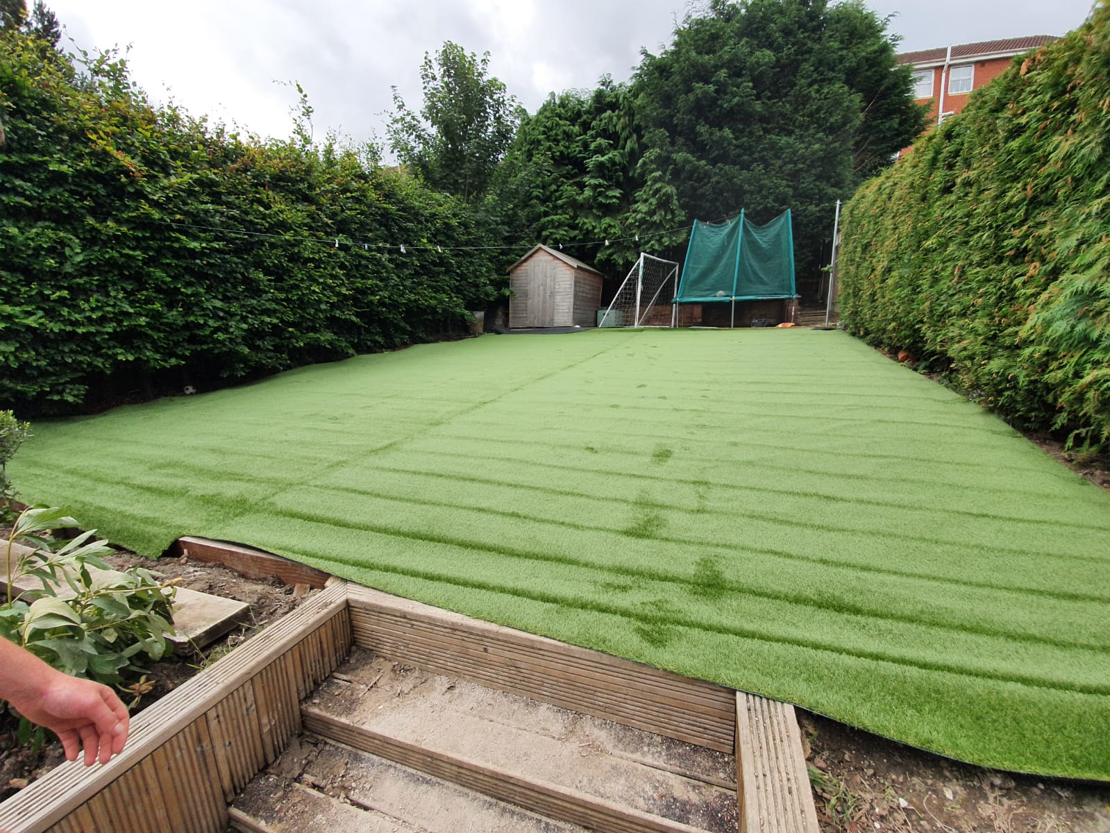 Artificial grass install 85m2 in Dodworth Barnsley - artificial grass rolled out