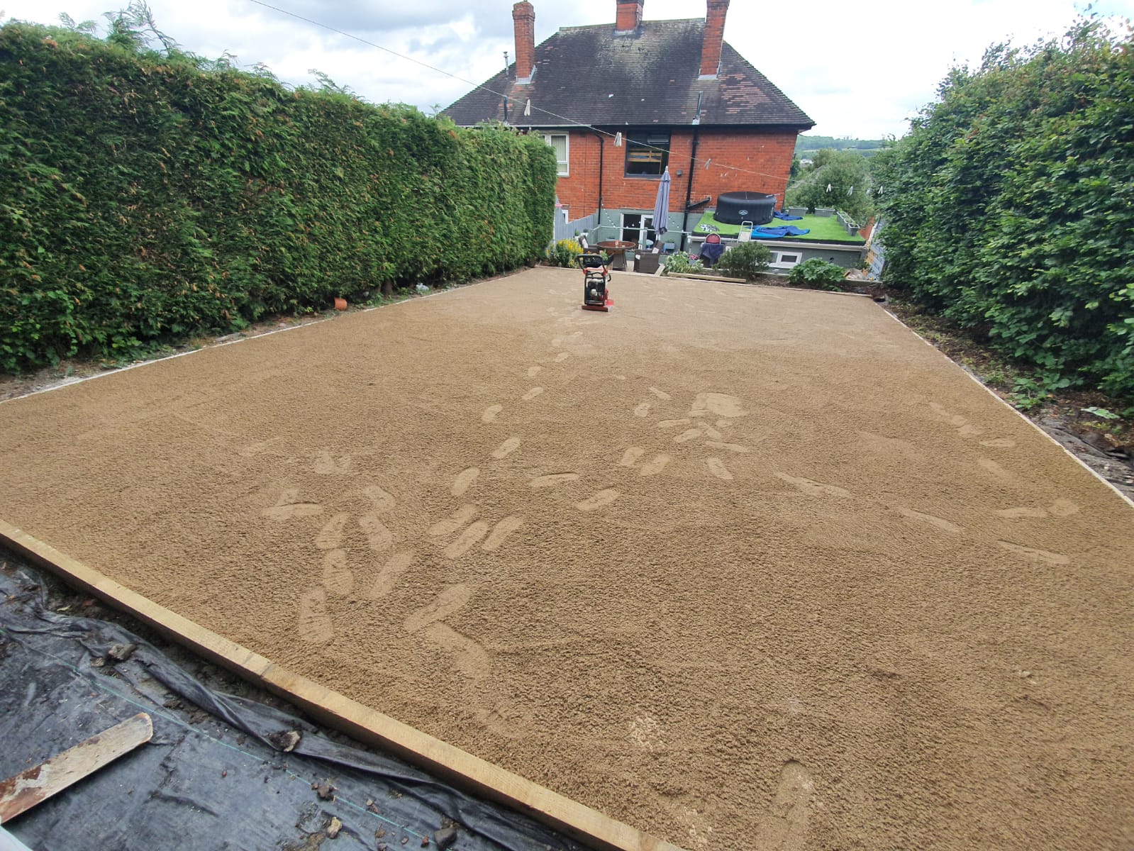 garden area flattened and sanded before laying the artificial grass in Chesterfield