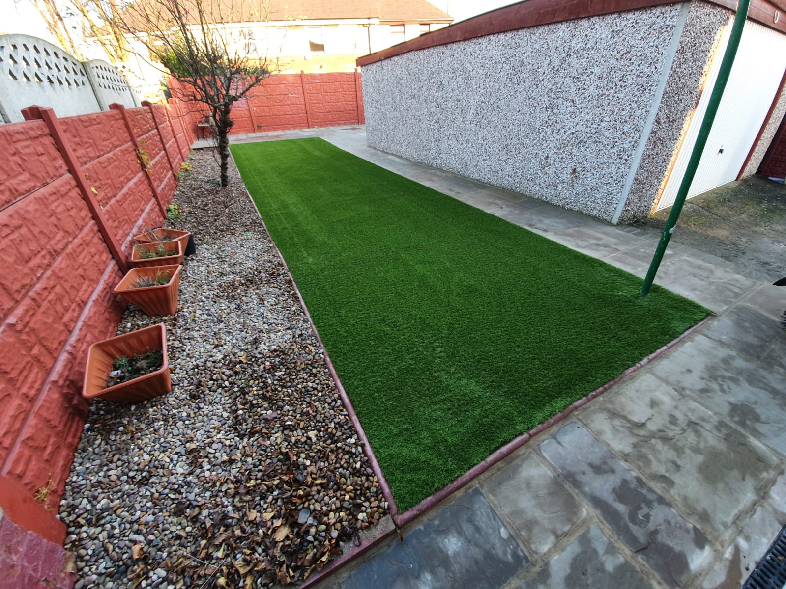 Completion of a 30m2 area of artificial grass in a Doncaster garden