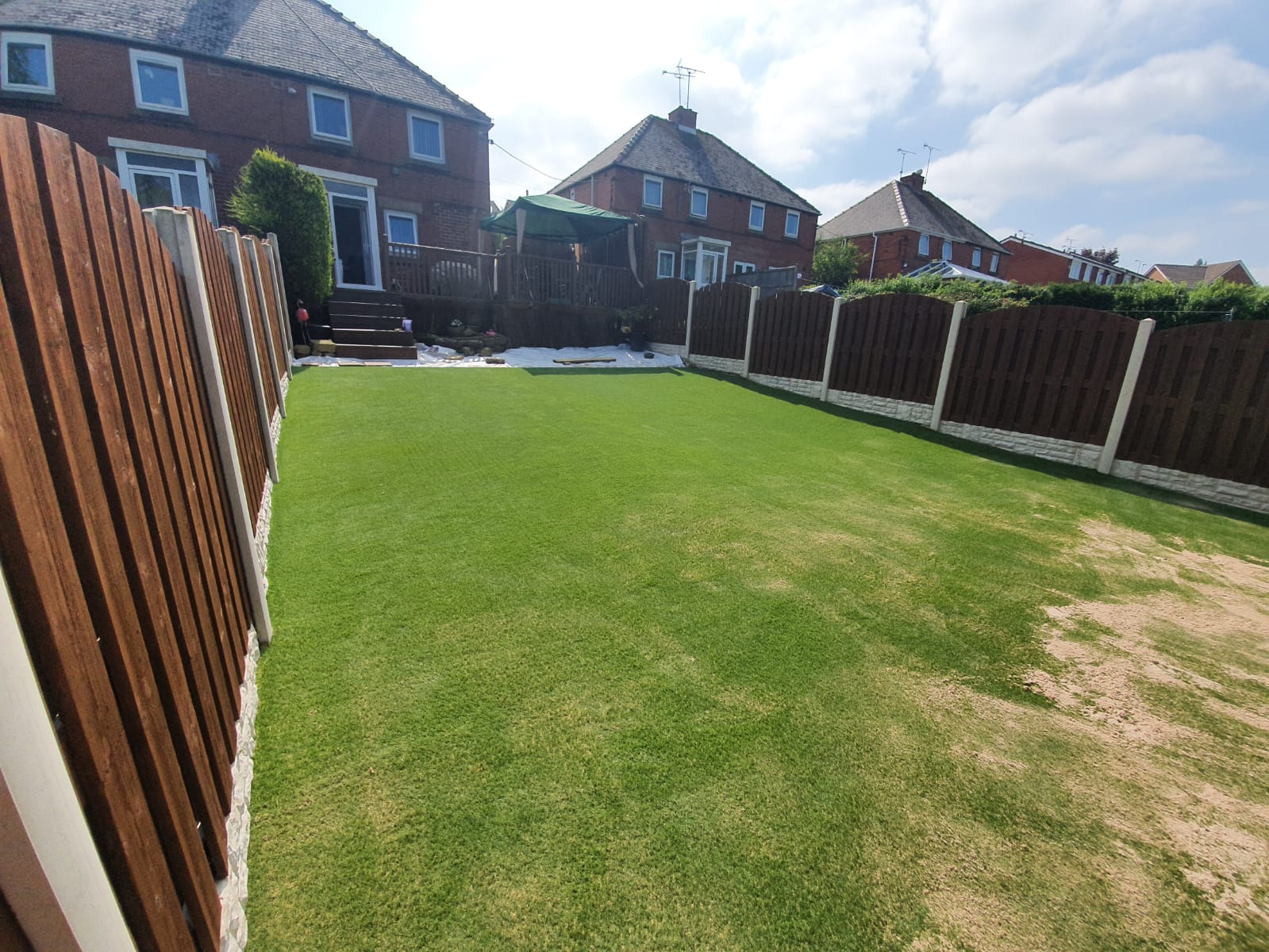 Large artificial lawn about to have final sand layer brushed in Barnsley