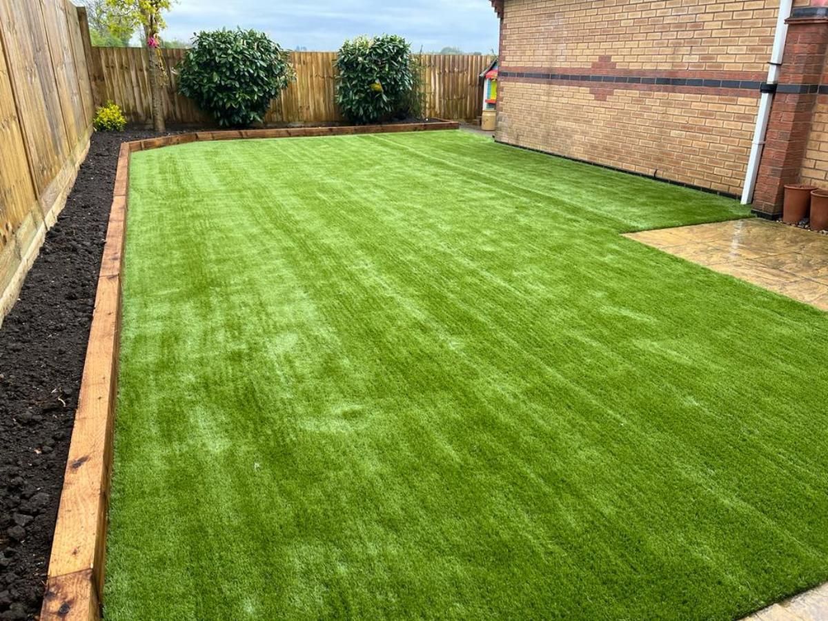Zest Artificial Grass Mansfield new artificial lawn with sleepers surrounding