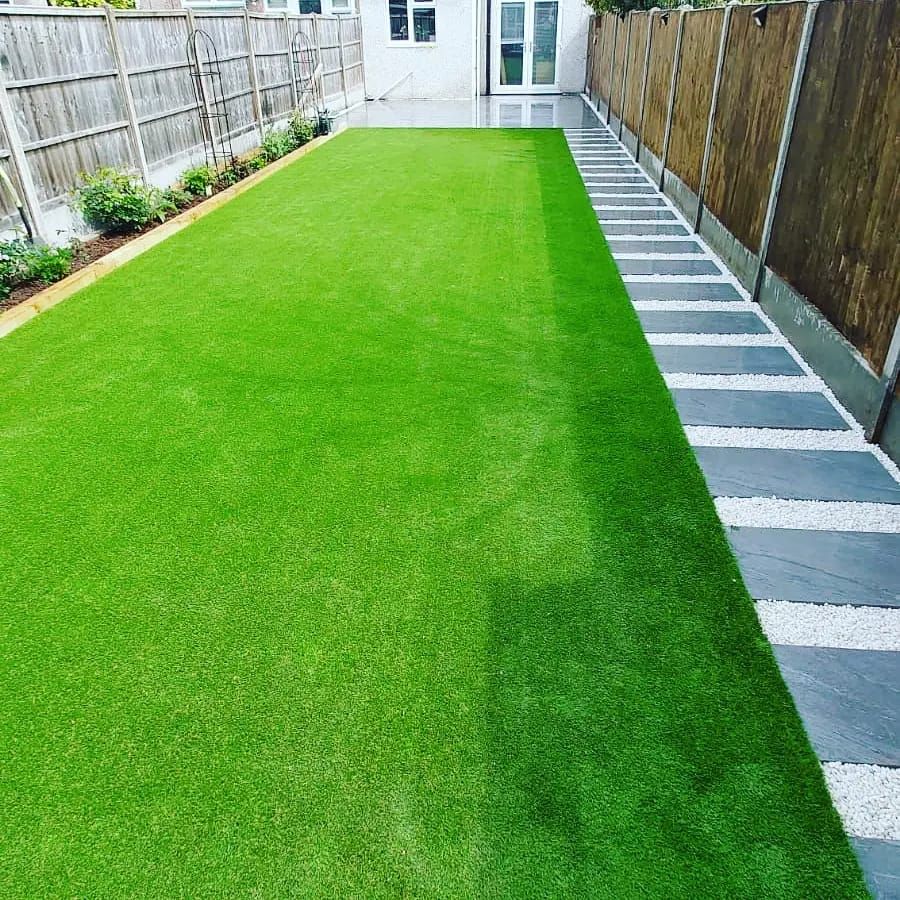 Zest Artificial Grass Luton new artificial lawn with sleepers on one side and paving on the other