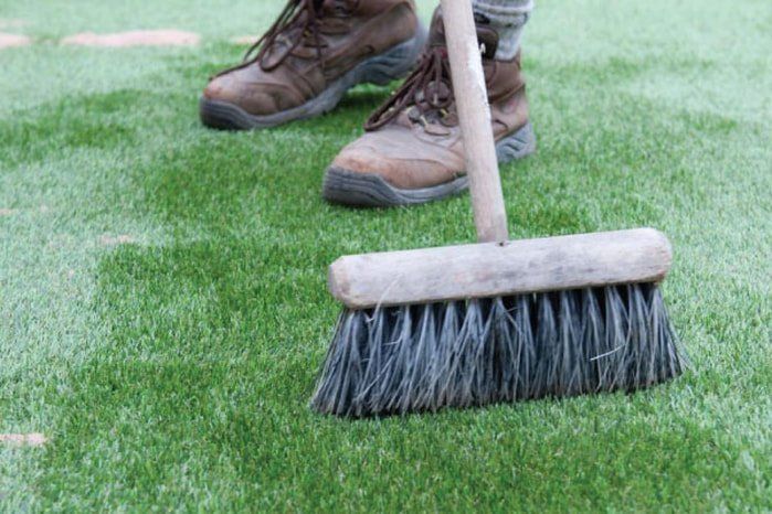 Zest Artificial Grass Matlock - artificial turf having leaves swept up