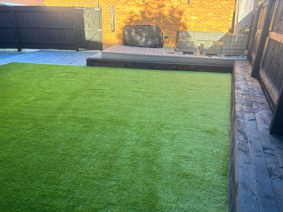 Zest Artificial Grass Dronfield new artificial lawn with sleepers on one side and paving on the other