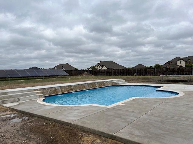 Pool With Concrete Pavers — Dallas, TX — Heavenly Pools