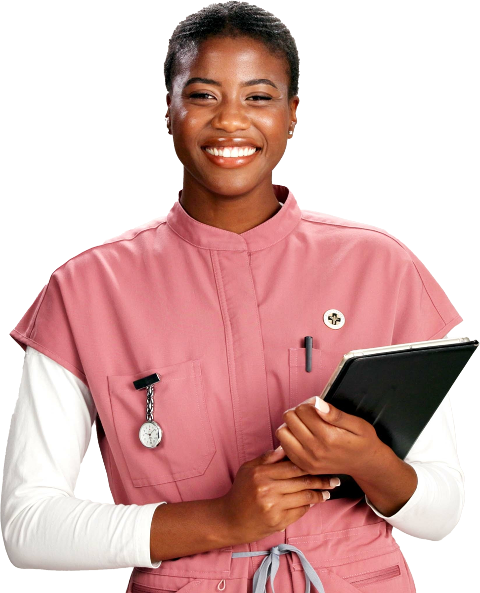 Nurse smiling, holding a clipboard and pen, wearing a pink uniform.