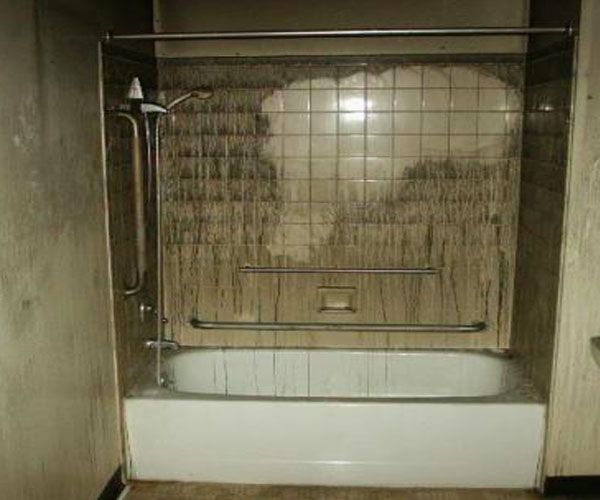 Bathroom Before - Lansing, MI - Sunrise Cleaning & Construction Services