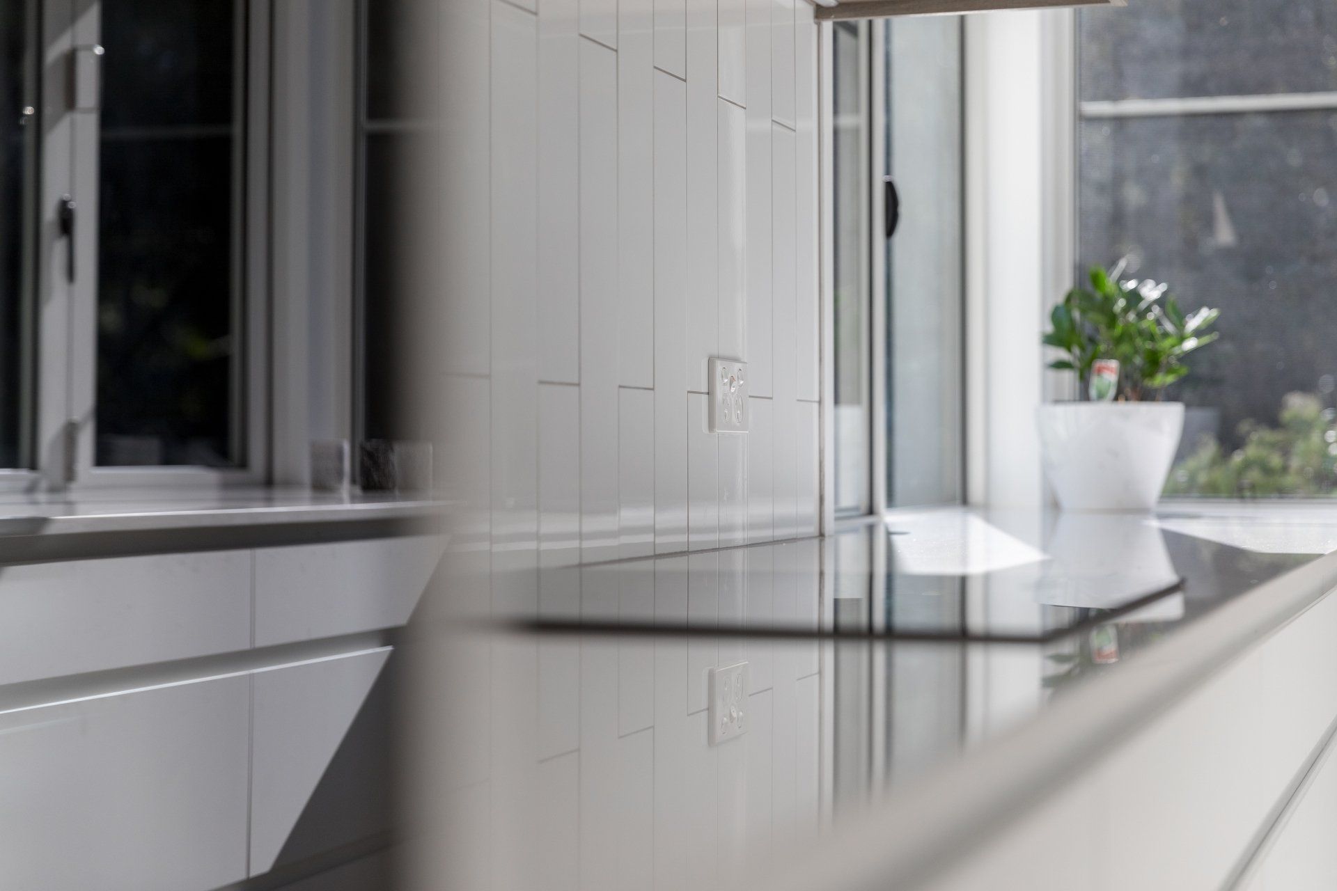 White Outlets In A White Tiles — Platinum Kitchens & Bathrooms In Coffs Harbour NSW