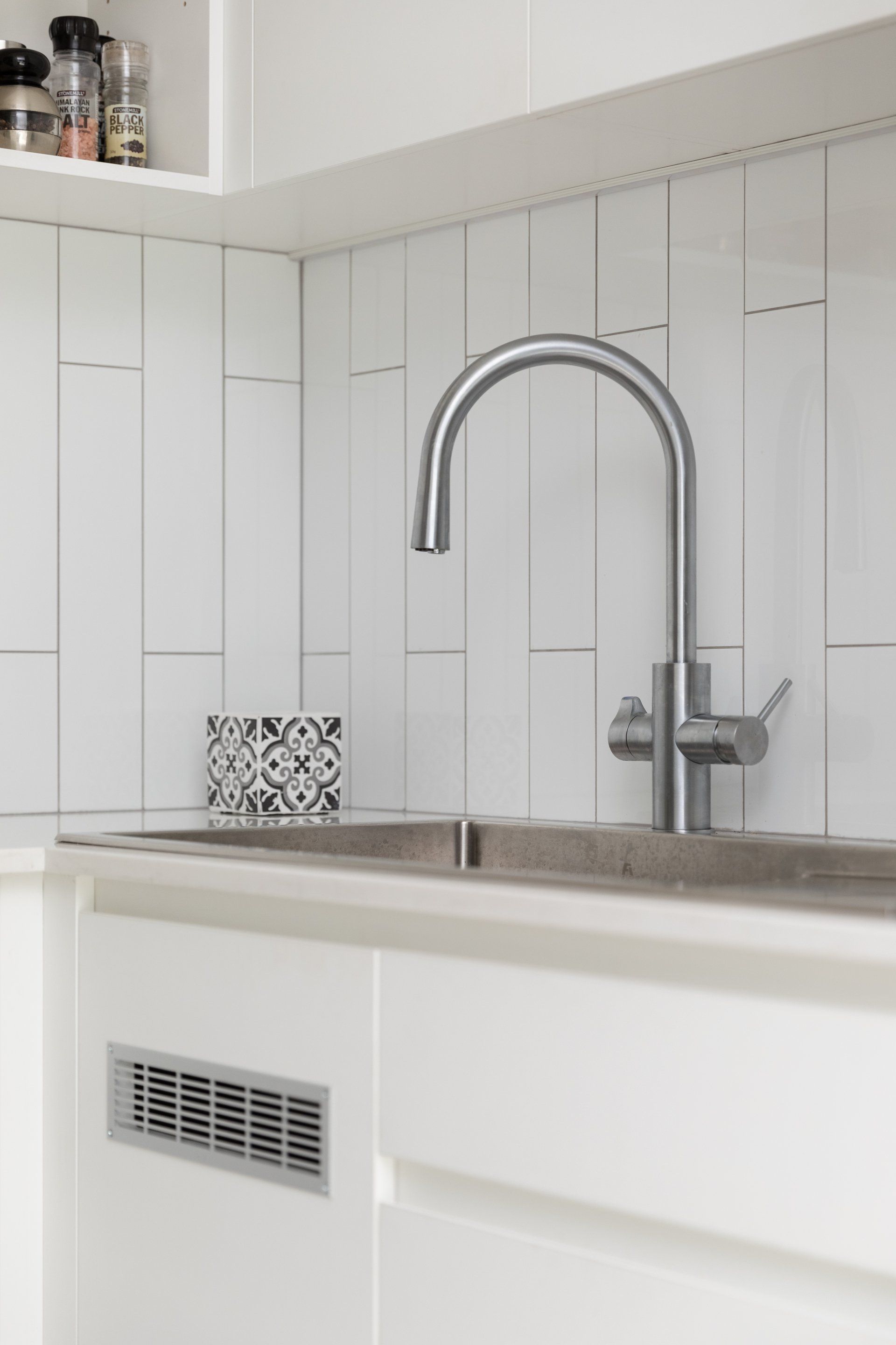 White Tiled Splashback with Sink — Platinum Kitchens & Bathrooms In Coffs Harbour NSW