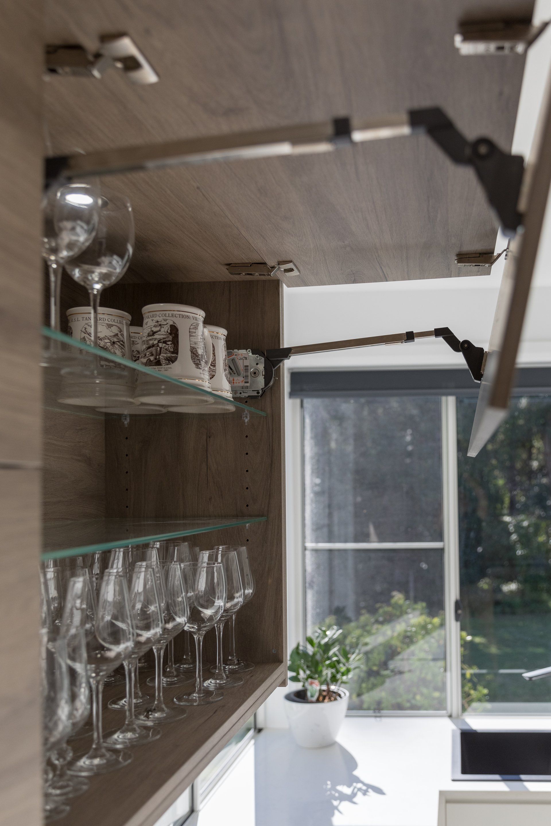 Wine Glasses Displayed in Cabinet — Platinum Kitchens & Bathrooms In Coffs Harbour NSW