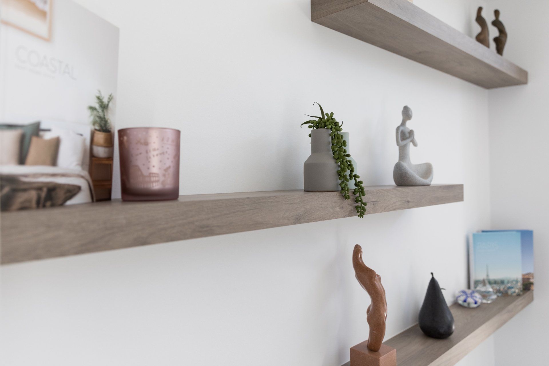 Shelves With Modern Figurines — Platinum Kitchens & Bathrooms In Coffs Harbour NSW