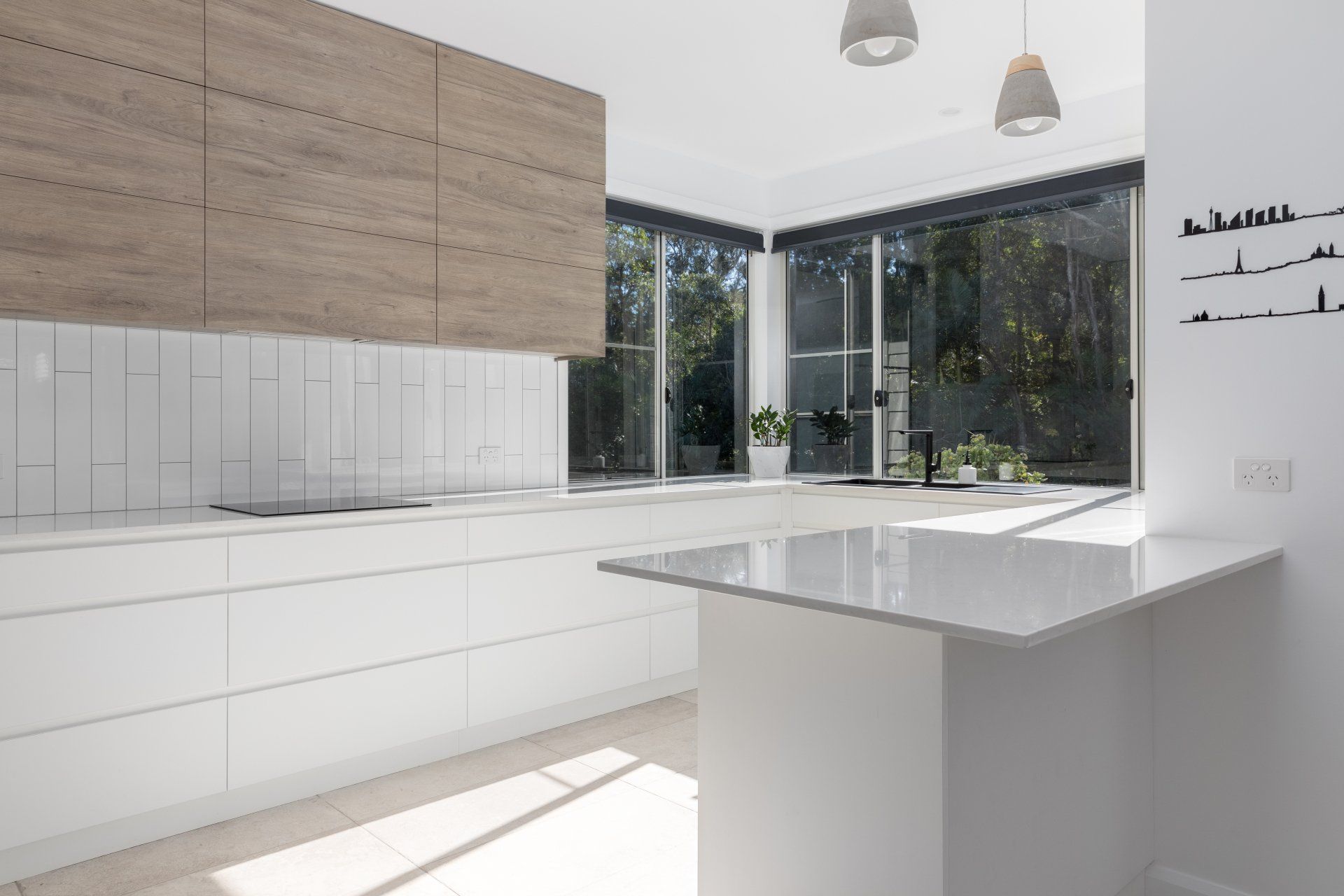 Modern White Kitchen Countertop With Sink — Platinum Kitchens & Bathrooms In Coffs Harbour NSW