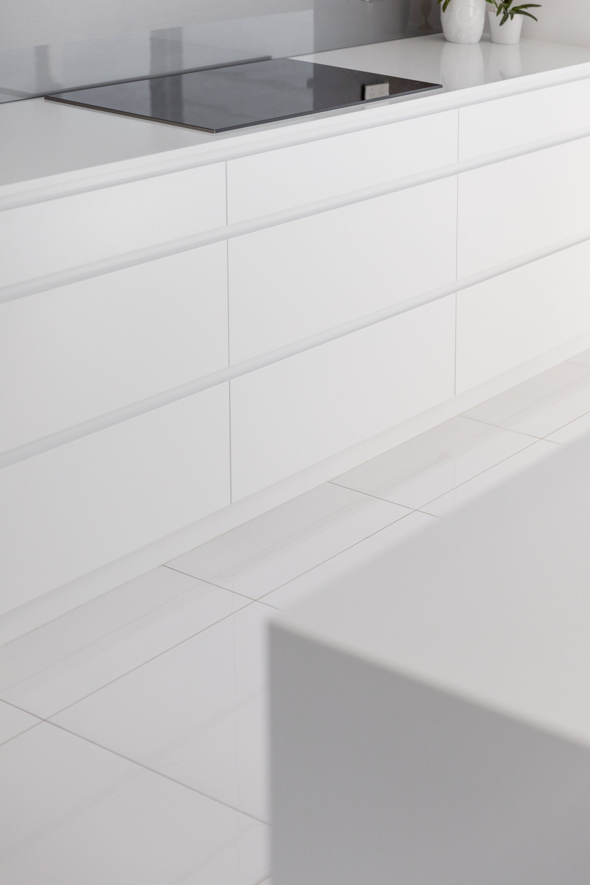Induction Cooktop In Kitchen — Platinum Kitchens & Bathrooms In Coffs Harbour NSW