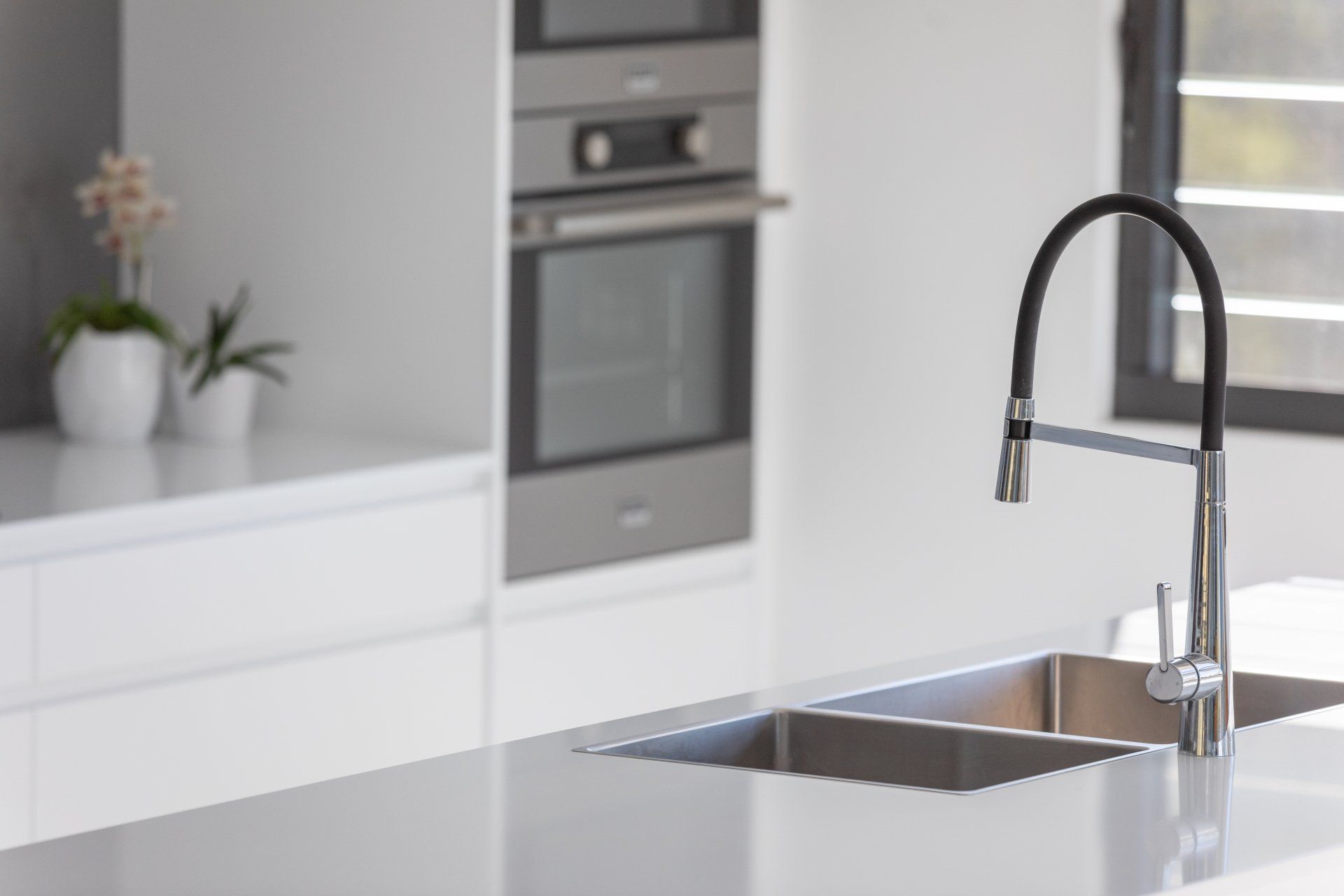 Side View Of Modern Kitchen Sink — Platinum Kitchens & Bathrooms In Coffs Harbour NSW