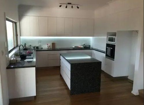 Platinum Kitchen With Black Island — Platinum Kitchens & Bathrooms In Coffs Harbour NSW