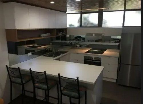 Platinum Kitchen With Steel And White Colour — Platinum Kitchens & Bathrooms In Coffs Harbour NSW