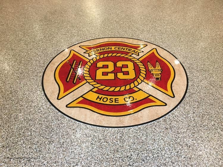 Embedded Logos in your epoxy and polyaspartic coating finish.