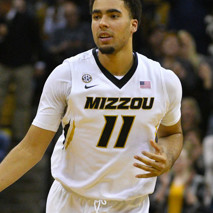 Basketball player in white 