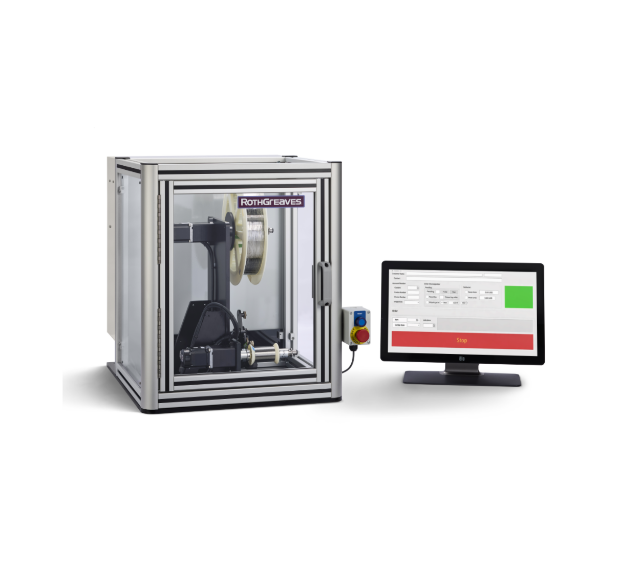 A computer is sitting on a desk next to a machine. coil winder repooler 2000