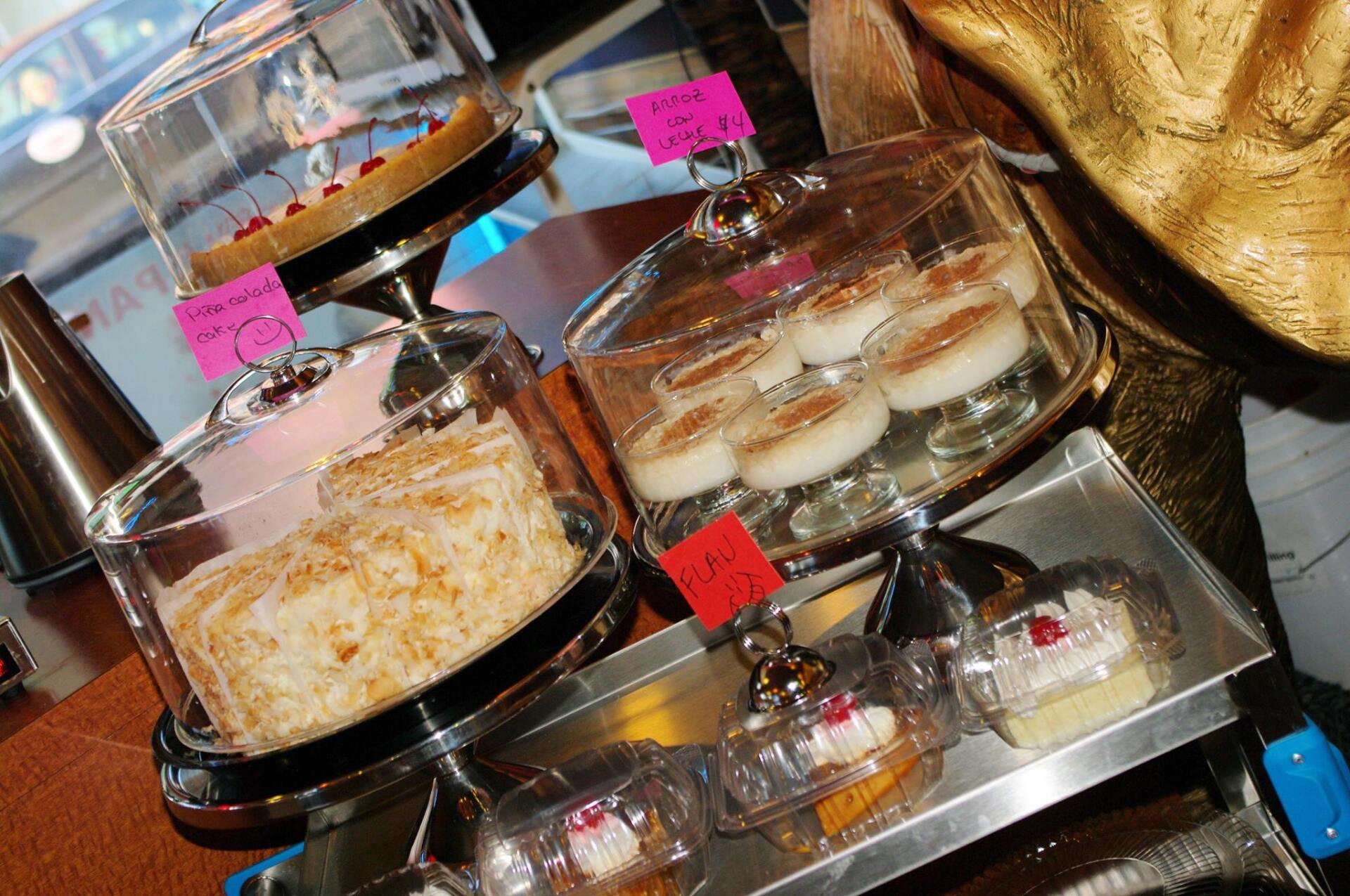 A variety of desserts are on display at a restaurant
