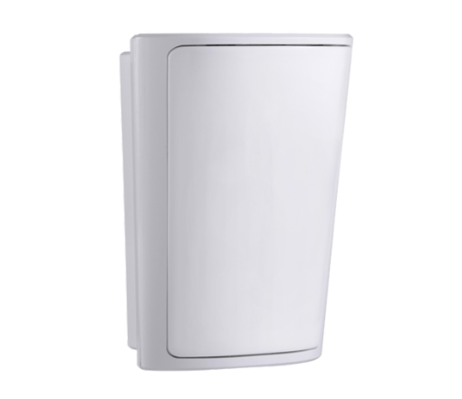 A white cylindrical object is sitting on a white surface.