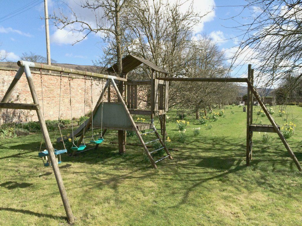 Children's play area in the walled garden at Ingleby Manor