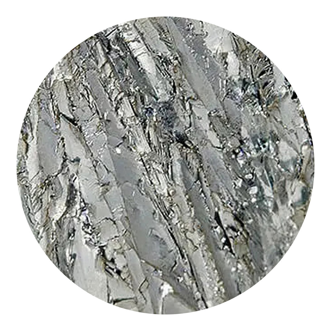 A close up of a zinc texture in a circle on a white background.