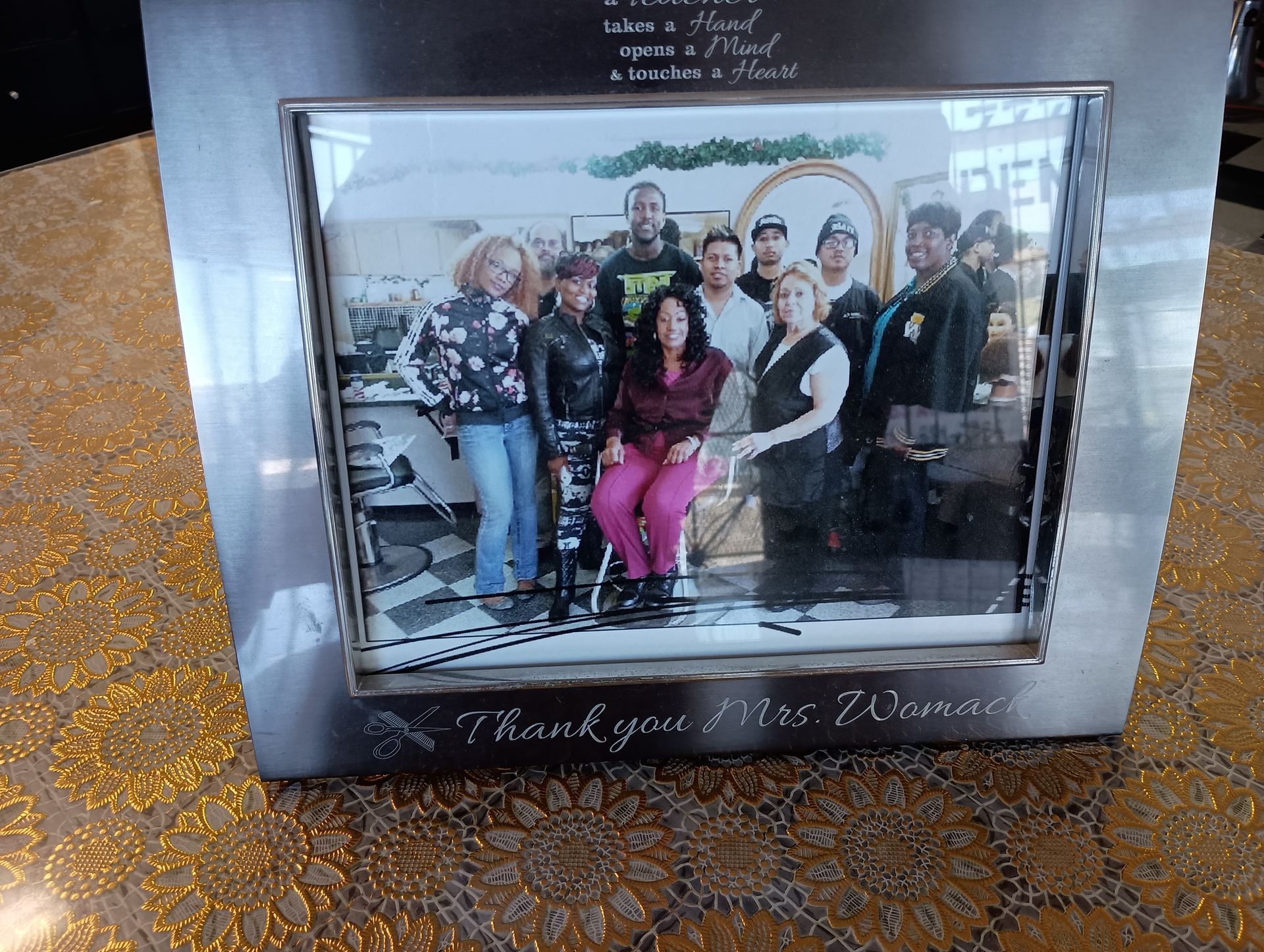 A picture of a group of people in a frame that says thank you