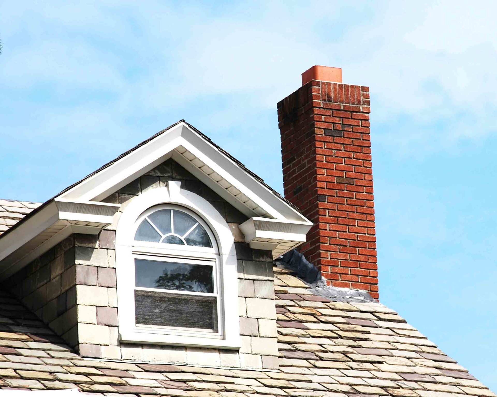Close Up Chimney On The Roof — Catonsville, MD — Flue Masters Inc