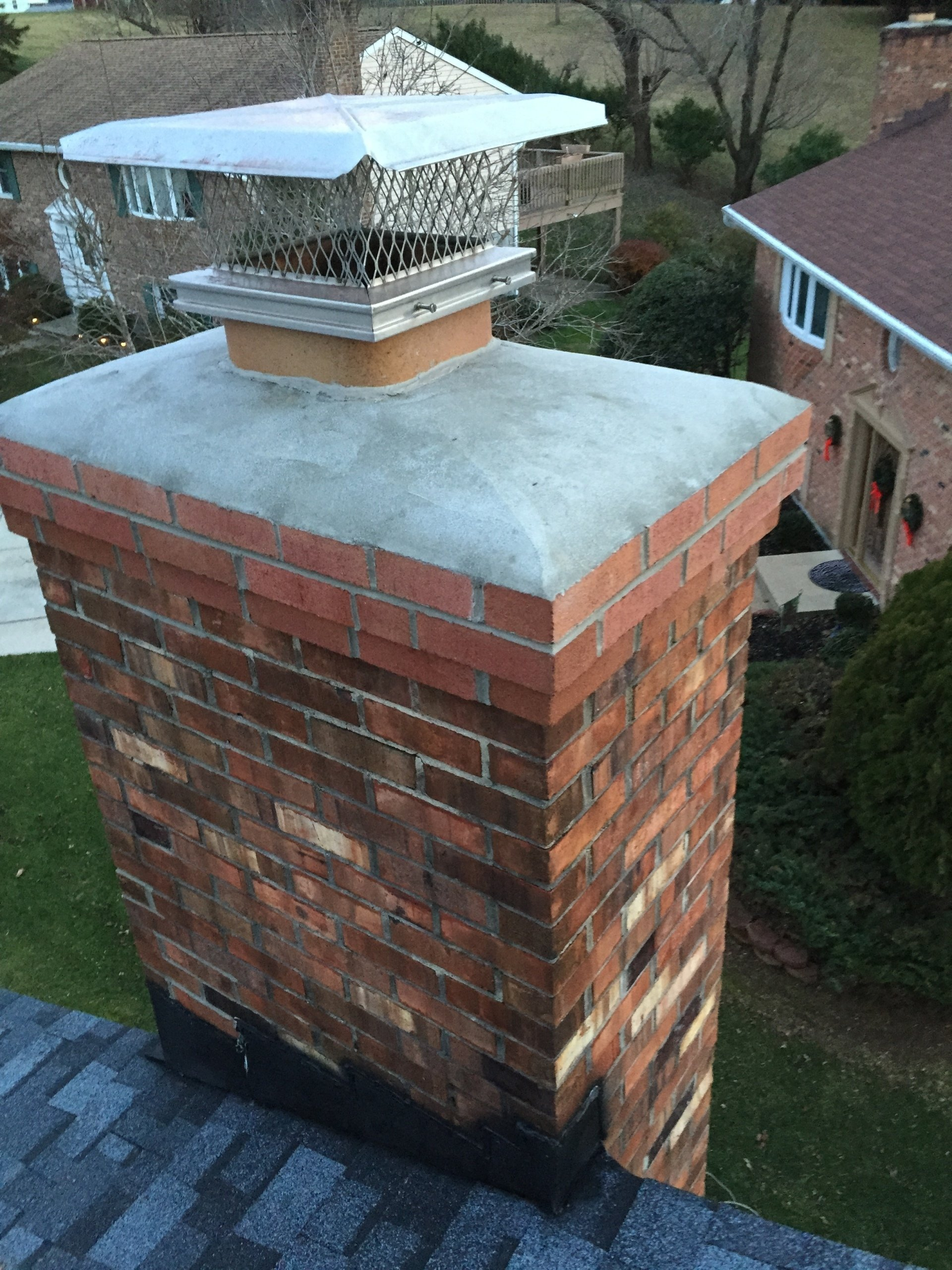Rooftop And Chimney Under Blue Sky — Catonsville, MD — Flue Masters Inc