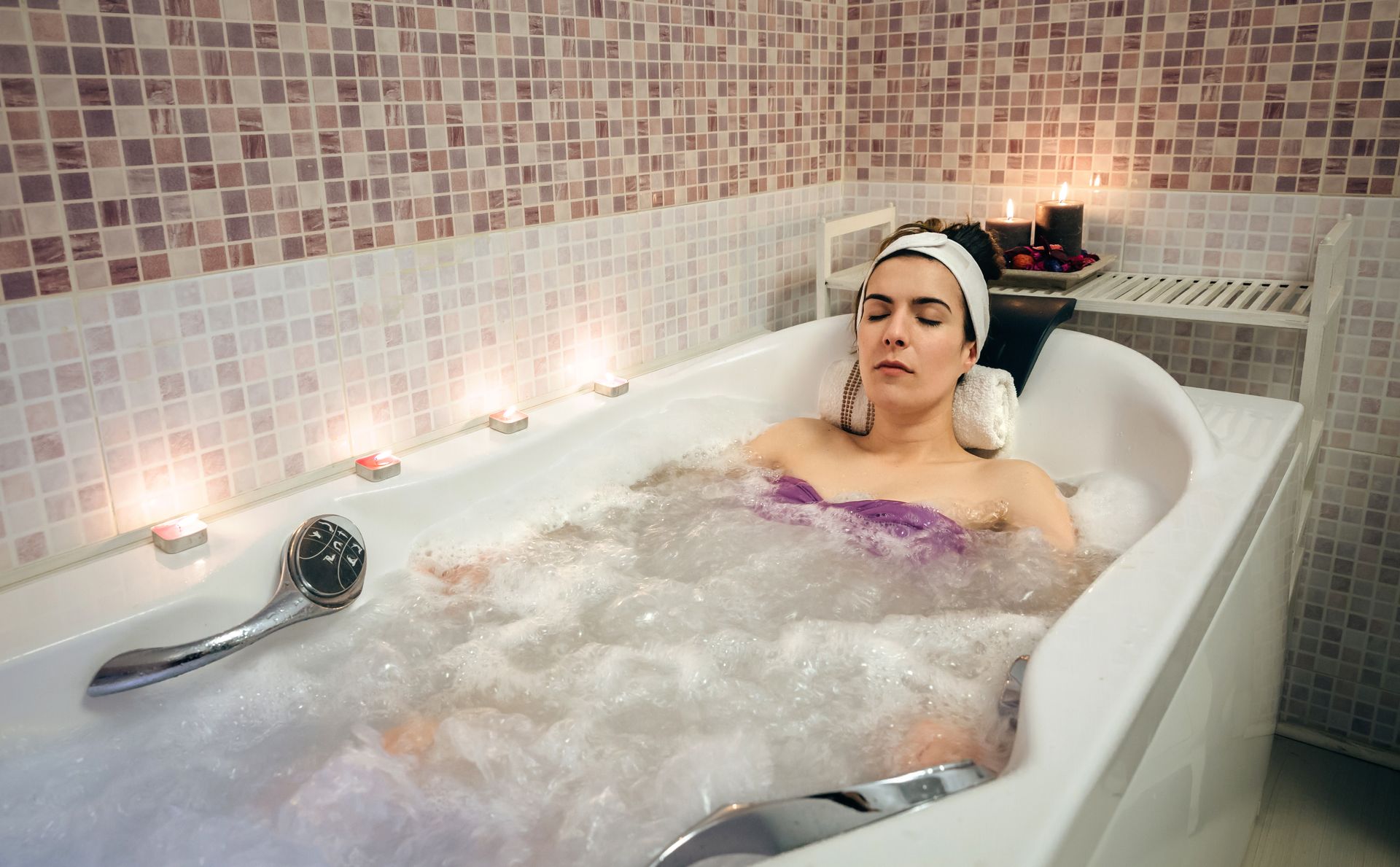 Woman Relaxing in the Bath Tub
