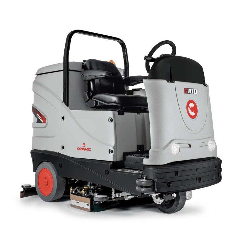 macchina lavapavimenti industriale, con uomo a bordo