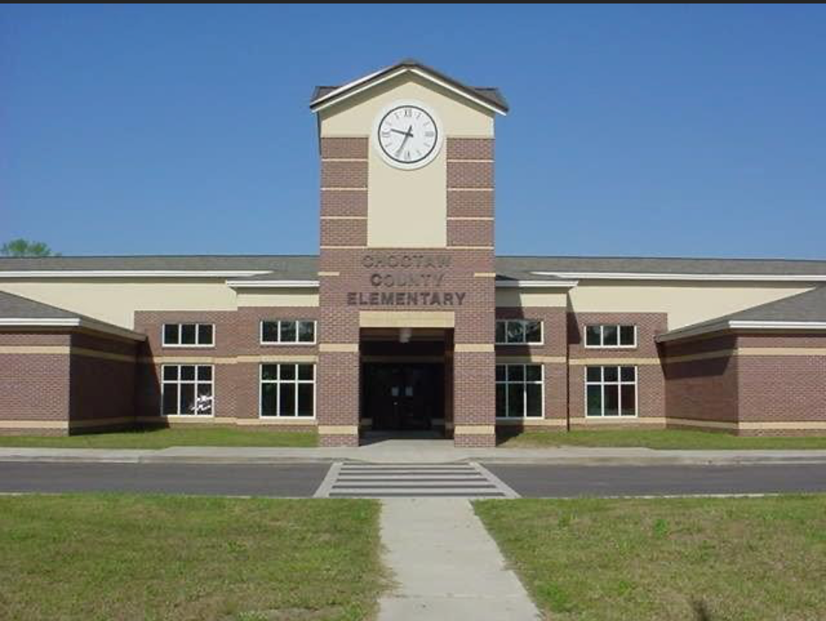 a large brick building with the word elementary on it