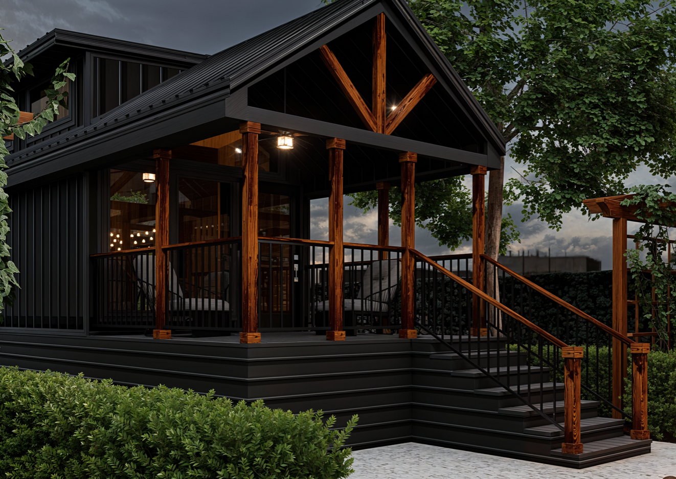 A black house with a wooden porch and stairs.