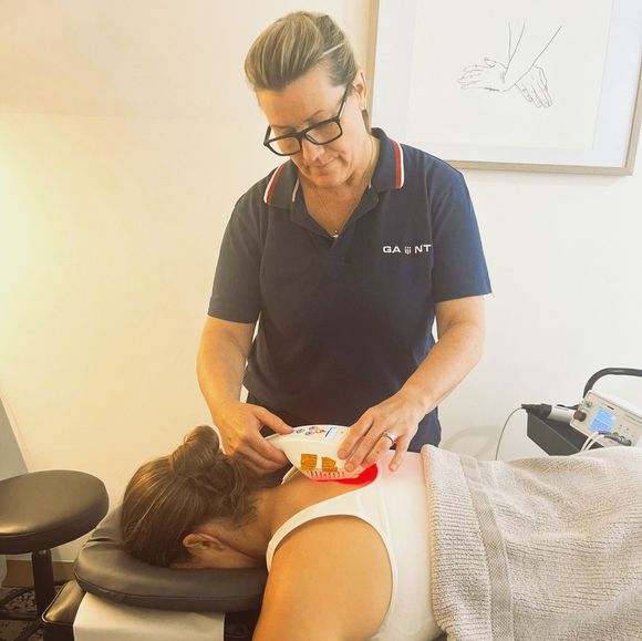 clinical physiotherapist working with an australian mining employee  in a remote location