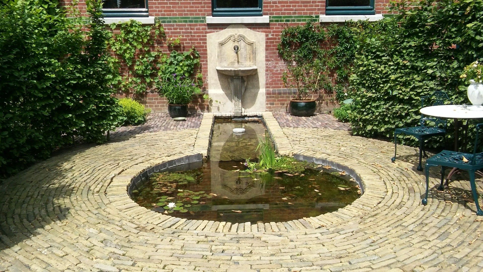 sleutelgat motief in vijver van Huize Marie Louise in Roermond KTK Tuinontwerp en Groenadvies