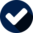 A white check mark in a blue circle with a long shadow.