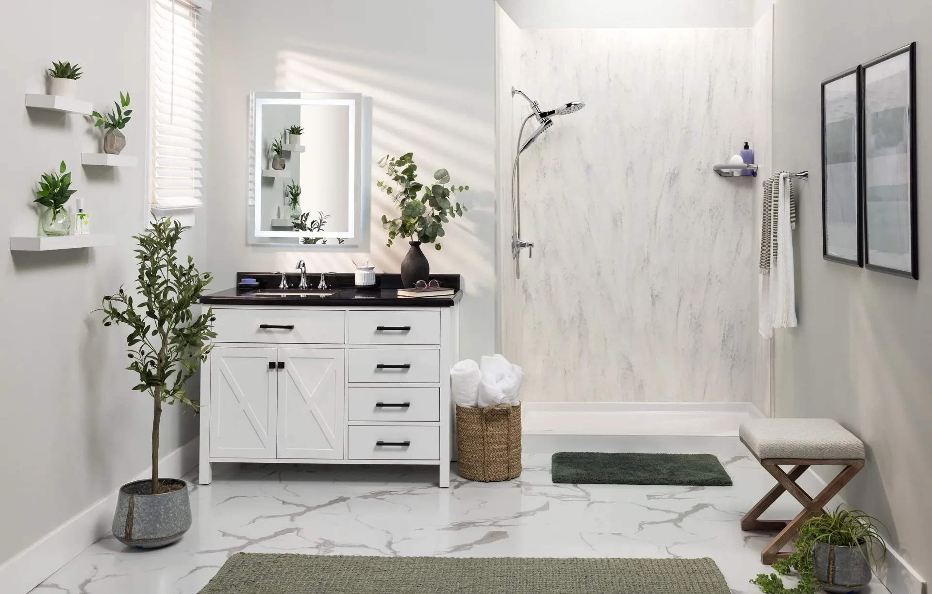 Bright modern white bathroom with vanity, mirror, shower, plants, and woven storage baskets