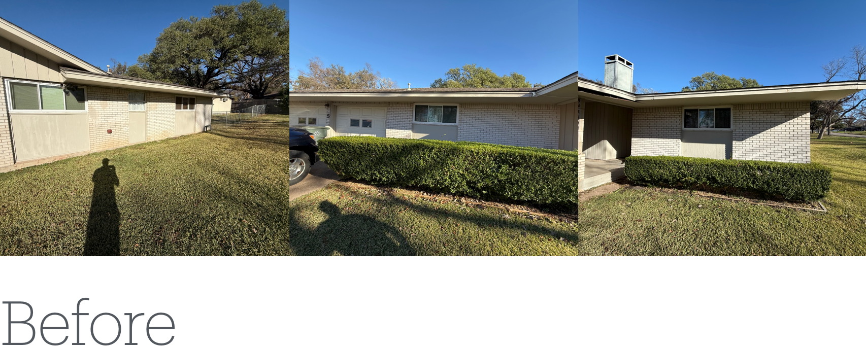 Exterior view of a house before work is done; concrete walls, green lawn, blue sky.