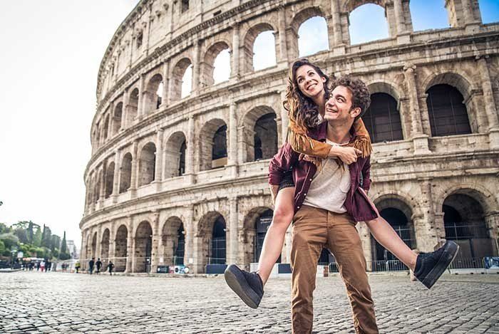Young couple at the Colosseum, Rome