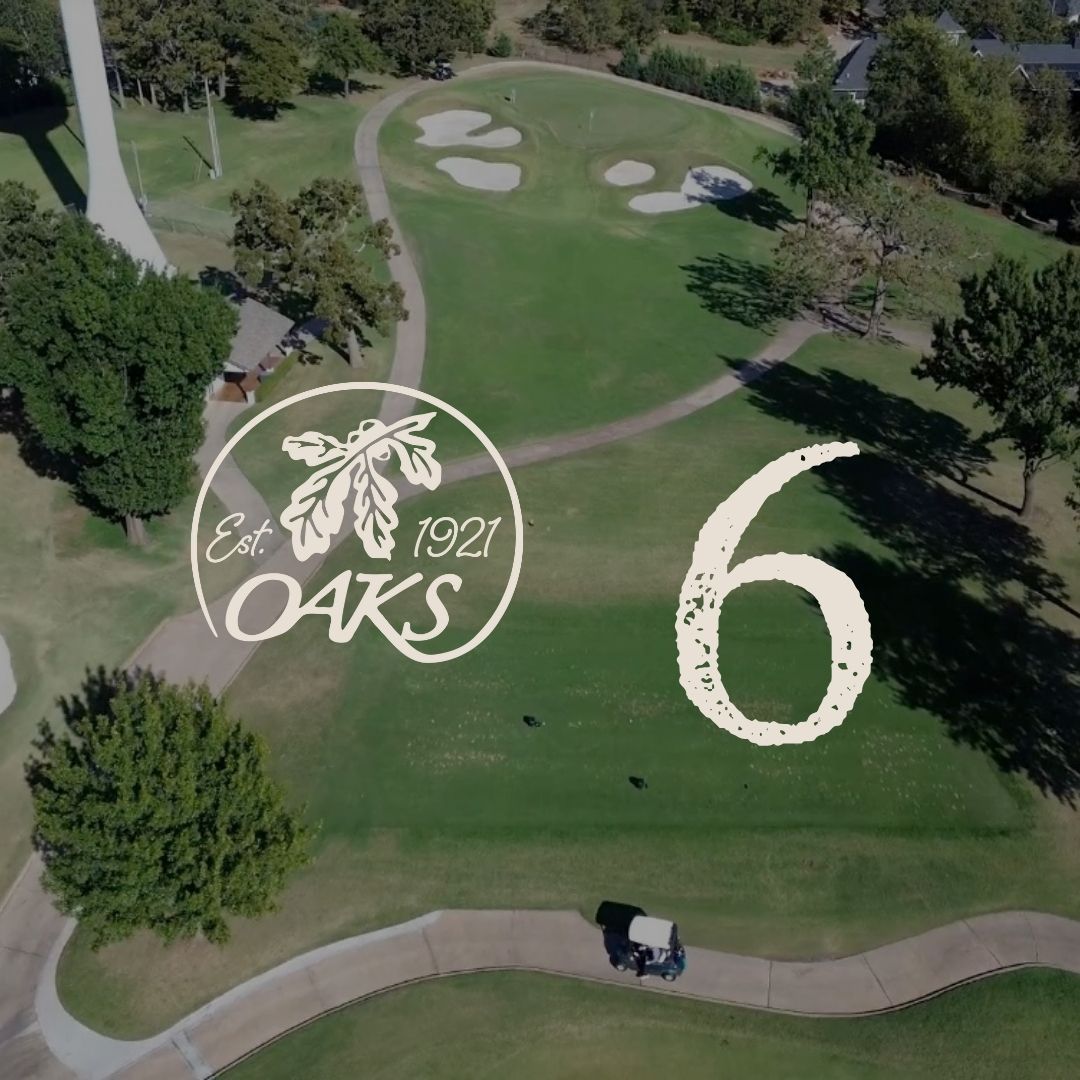 Aerial view of Oaks golf course hole 6 with logo and cart on path.